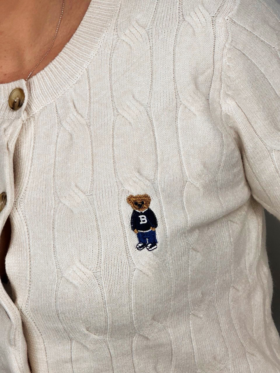 Cardigan College con dettaglio teddy Panna